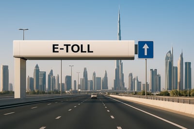Modern Dubai road with toll gate and skyline